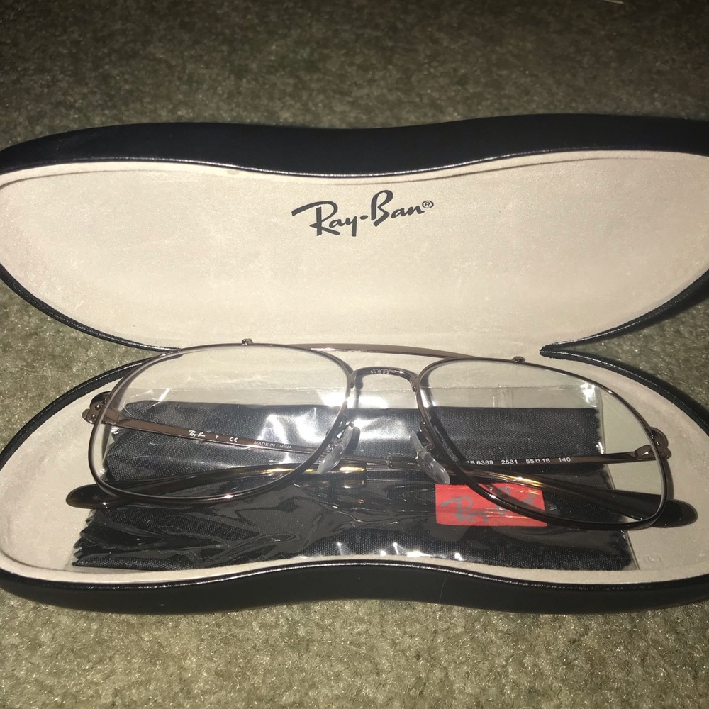 Men’s never used Ray Ban glasses with case